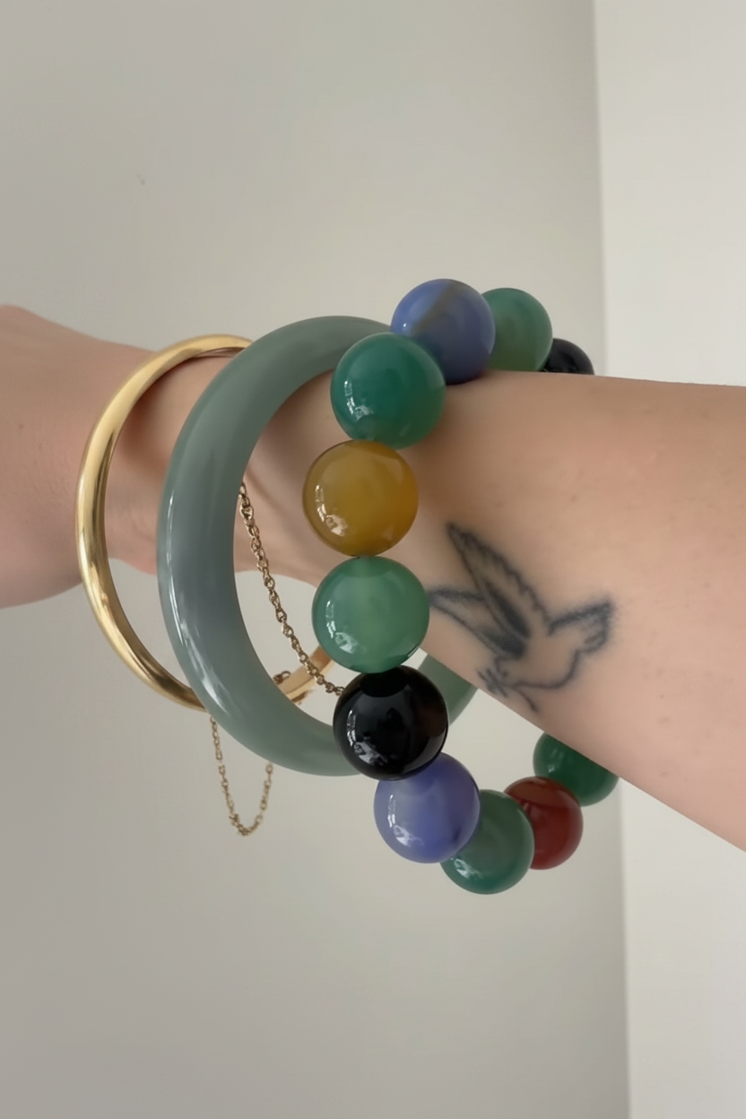 Close up of The Everyday multicolor stretch bracelet worn on wrist, Kismet Society fine jewelry