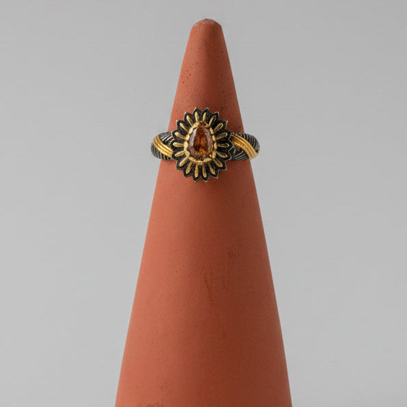 One of one pale pink tourmaline teardrop ring set inside darkened petal halo in sterling silver by Kismet Society — size 6.25