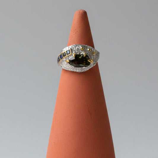 One of one green tourmaline east west ring with sapphire accents on granulated sterling silver band by Kismet Society — size 6.5