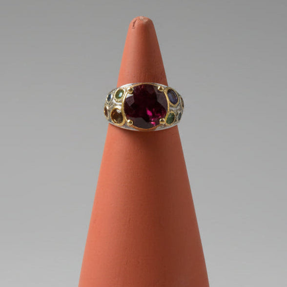 One of one rubelite and sapphire statement ring by Kismet Society — large center stone, size 6.25