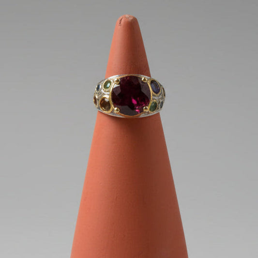 One of one rubelite and sapphire statement ring by Kismet Society — large center stone, size 6.25