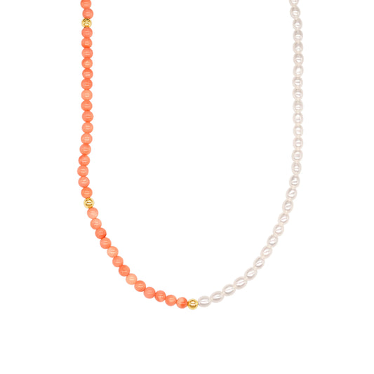 High-polished 14k gold necklace, featuring a luminous rice-shaped AAA+ freshwater pearl paired with Pink Coral.